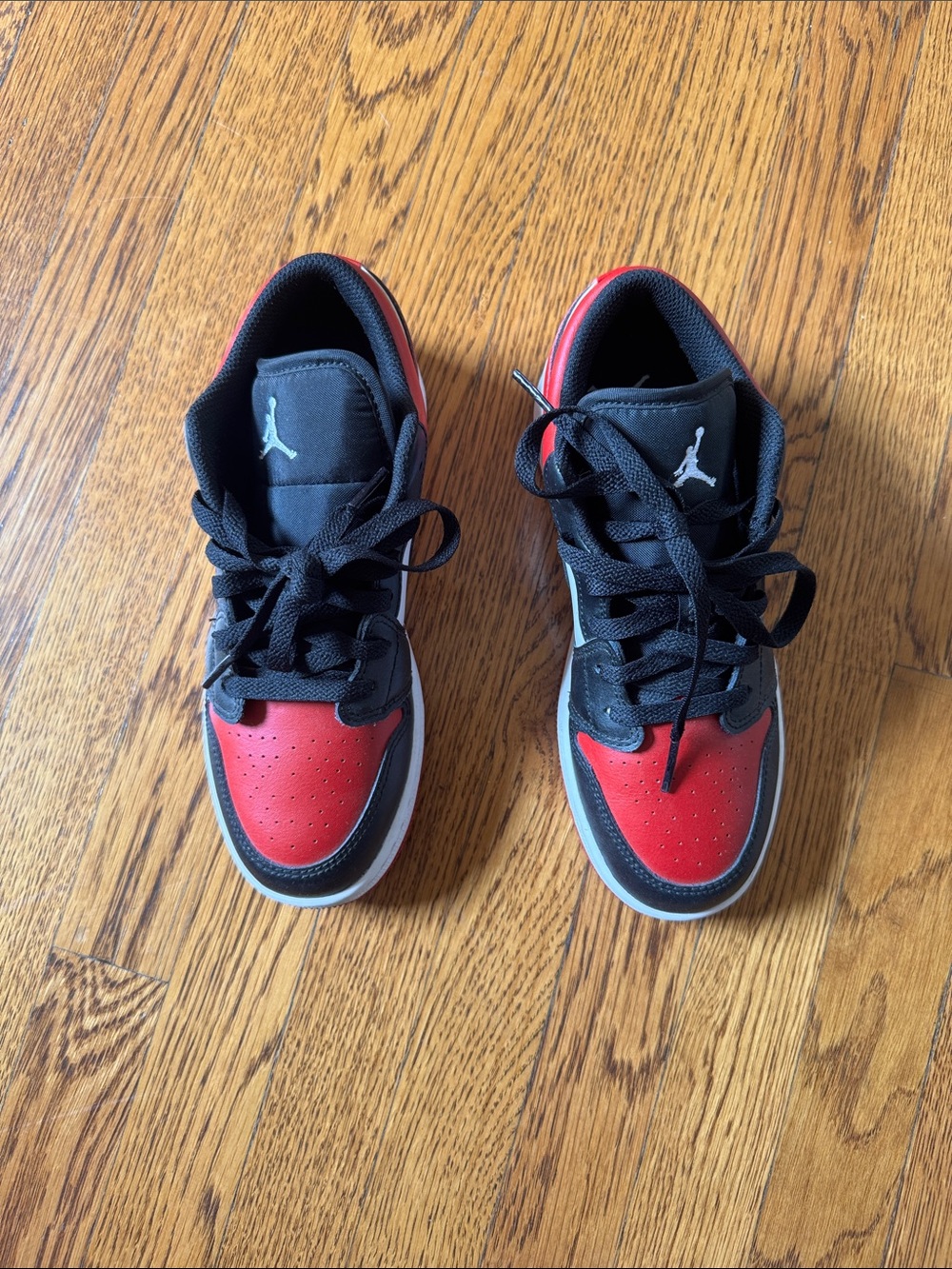 Jordan Kids Black and Red Low Top Sneakers with White Accents